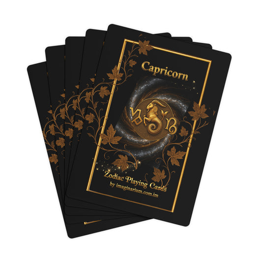 Playing cards with Capricorn design on a black background